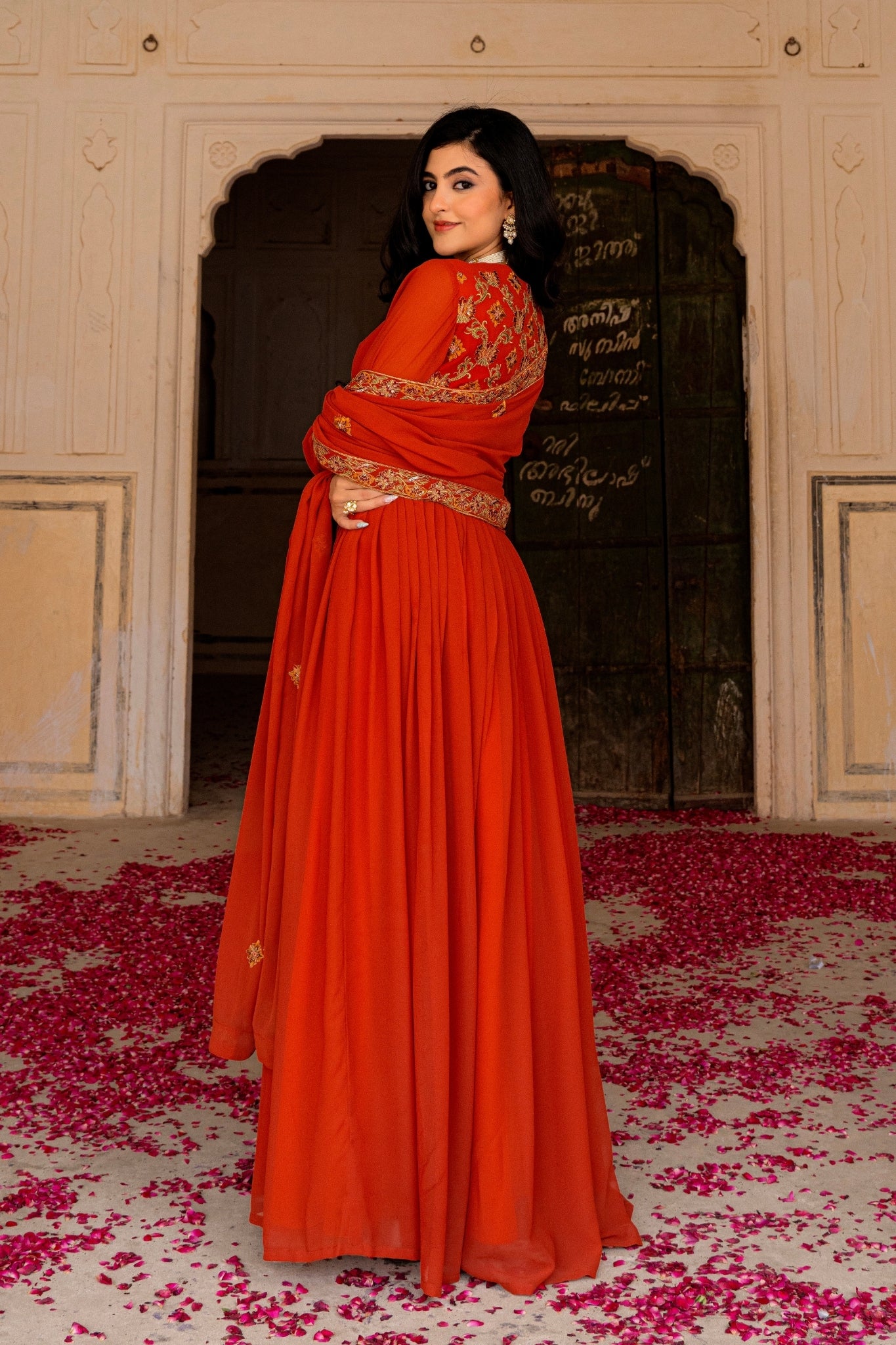 Radiant Orange Georgette Anarkali With Intricate Embroidered Detailing