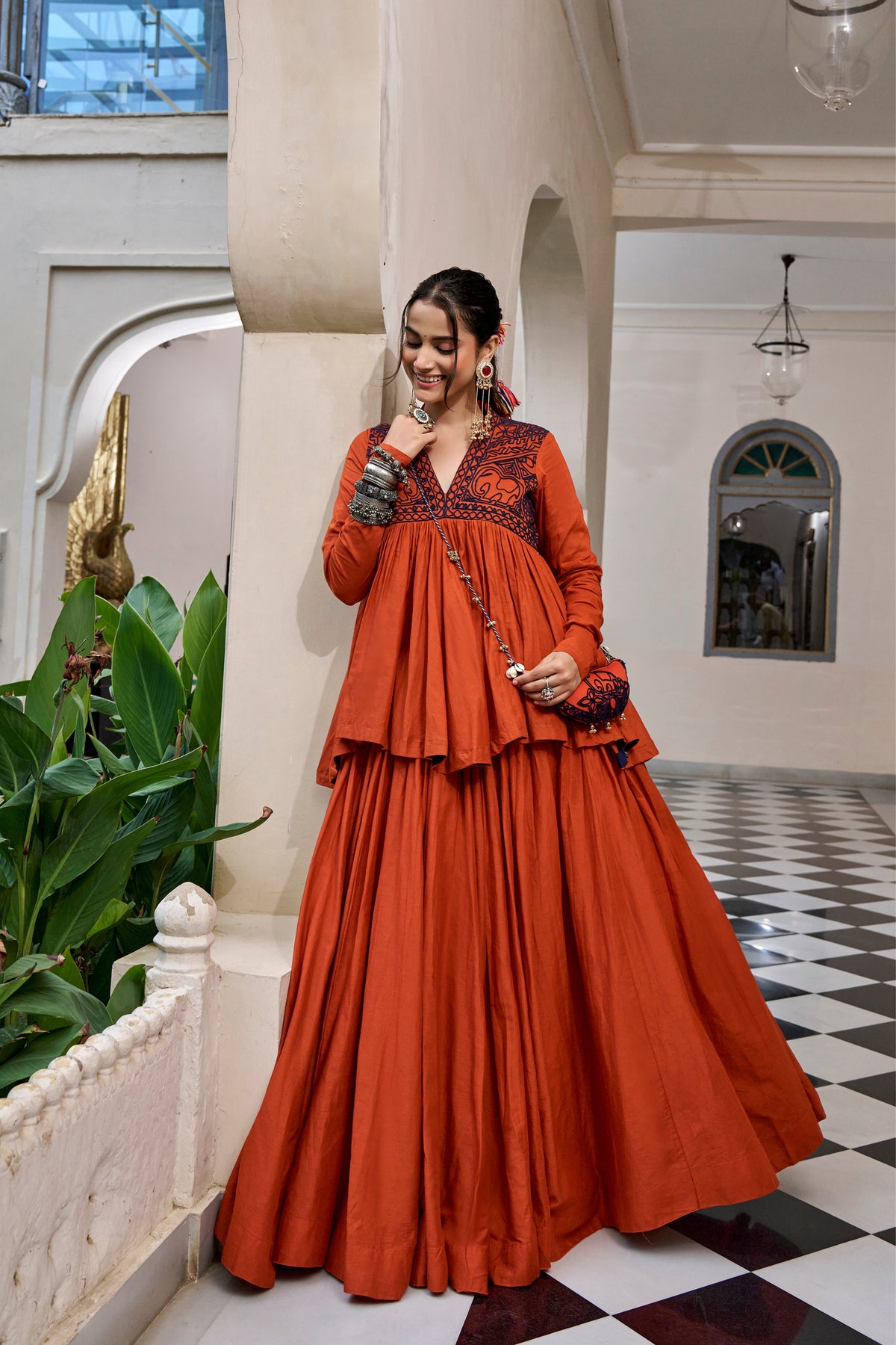 Rust Orange Pure Cotton Kashida Work Navratri Lehenga Choli With Matching Purse