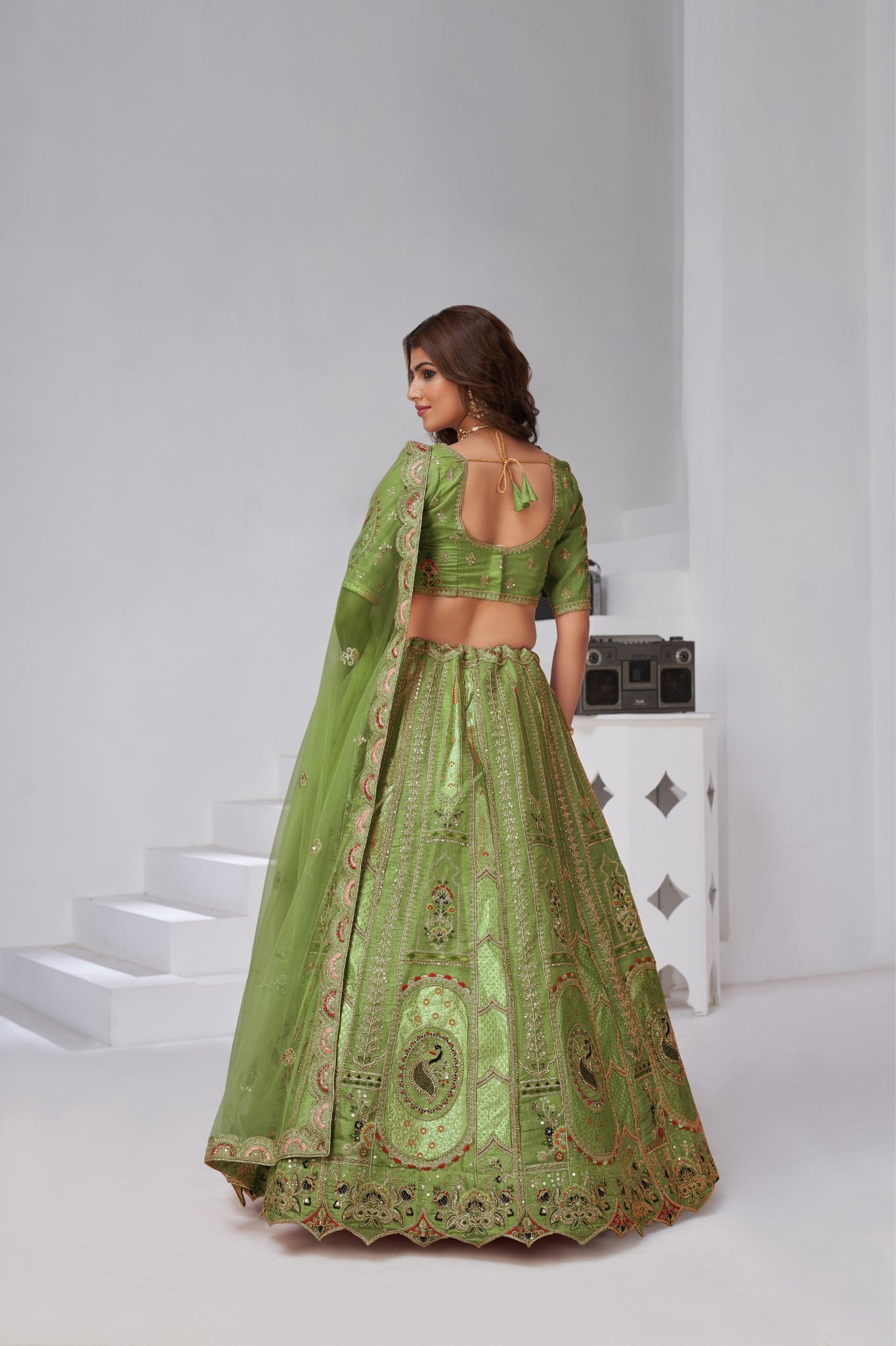 Opulent Aura Raw Silk Bridal Lehenga With Peacock And Paisley Motifs