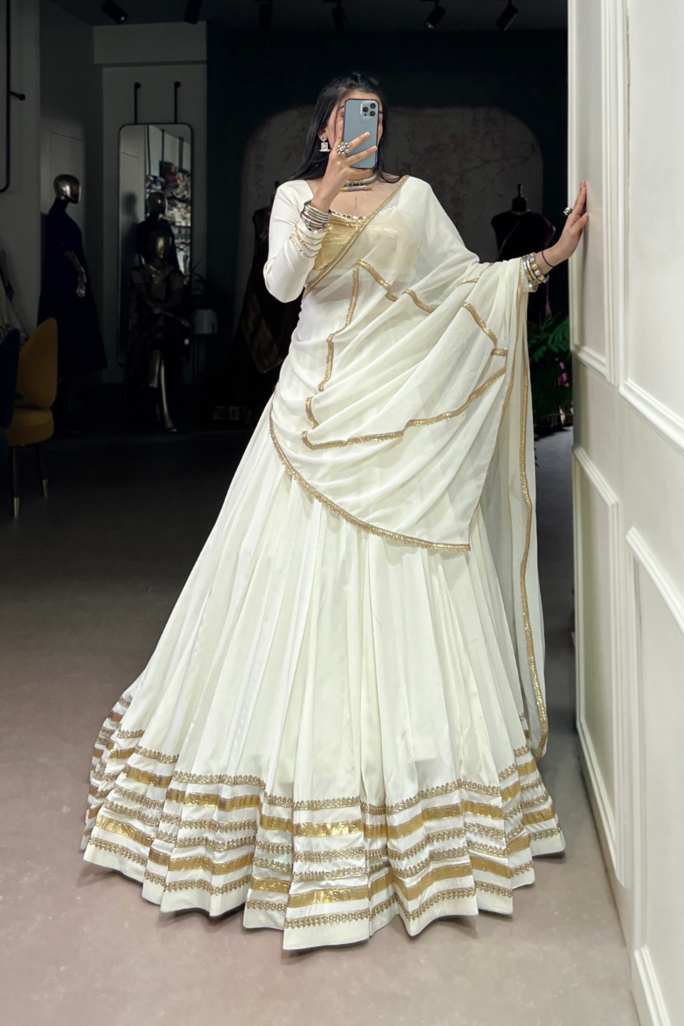 White Navratri Style Pure Rayon Embossed Design With Original Mirror Work Traditional Lehenga Choli Set