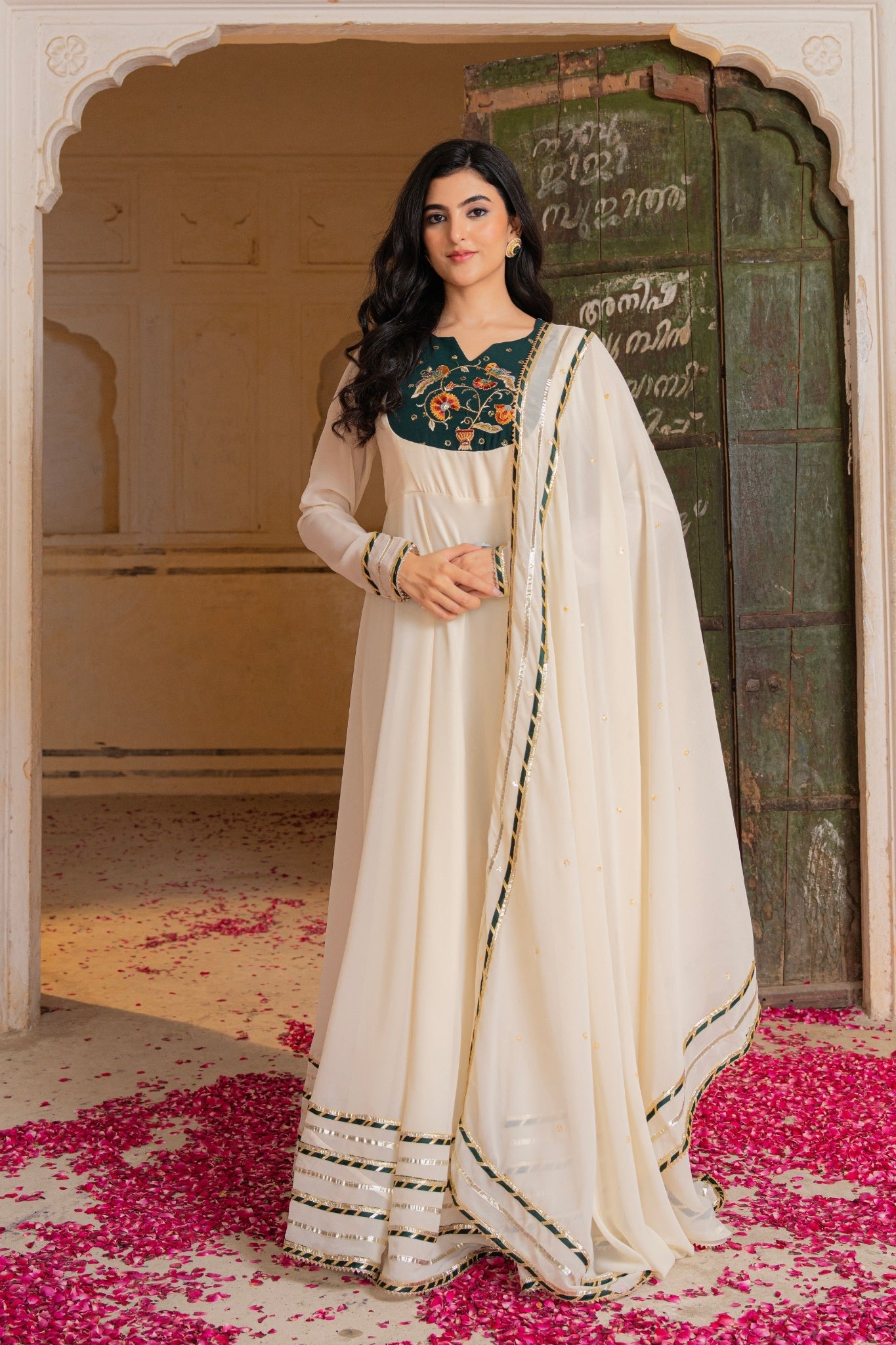 Royal Ivory Flow Anarkali Featuring Emerald Hand Embroidered Detail