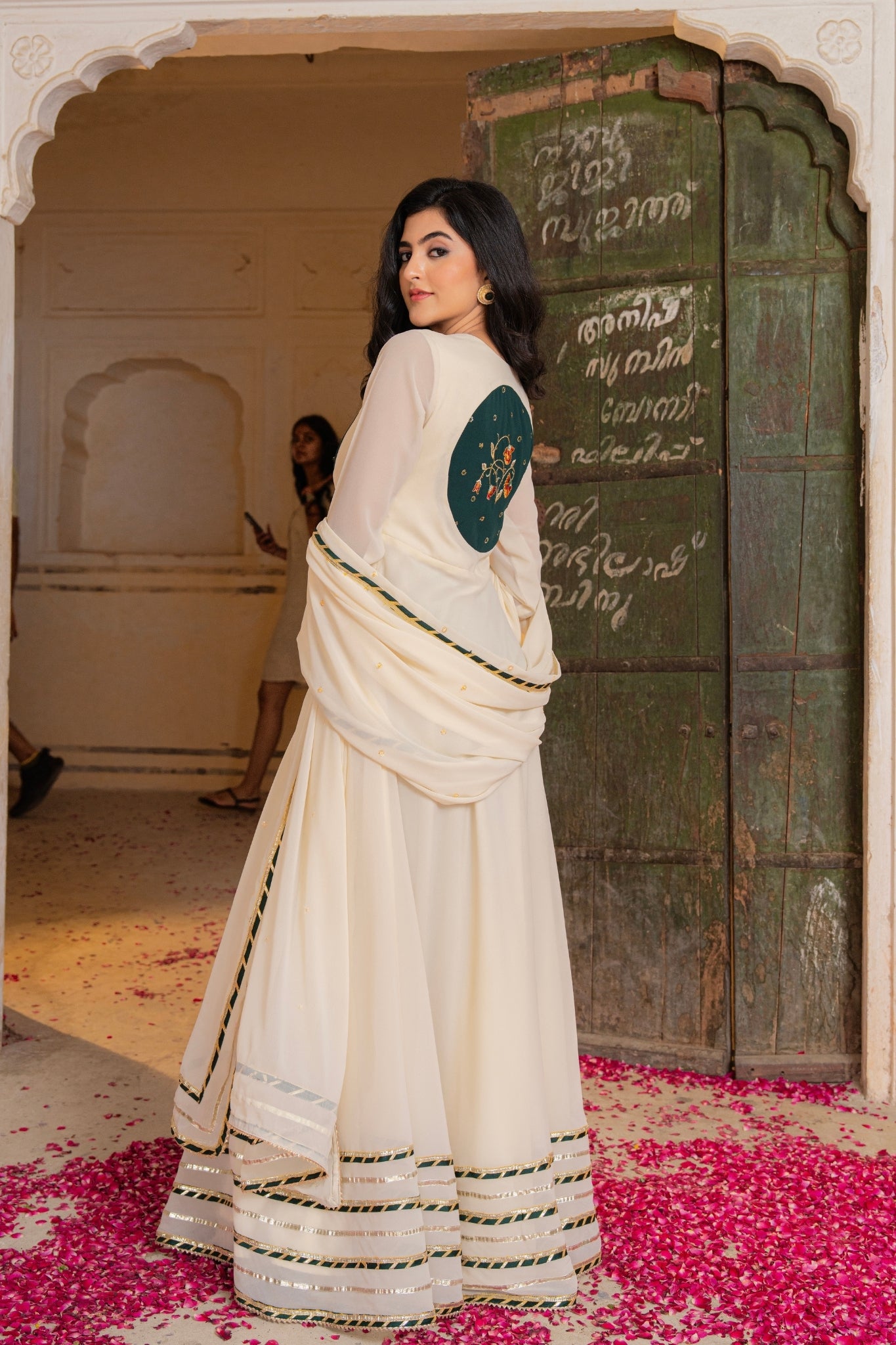 Royal Ivory Flow Anarkali Featuring Emerald Hand Embroidered Detail