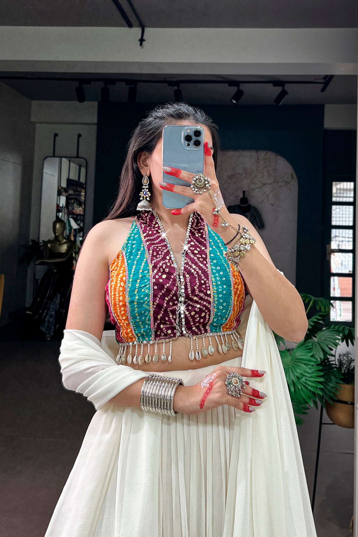 Ivory Tiered Navratri Garba Special Lehenga With Bandhani Mirror Work Blouse