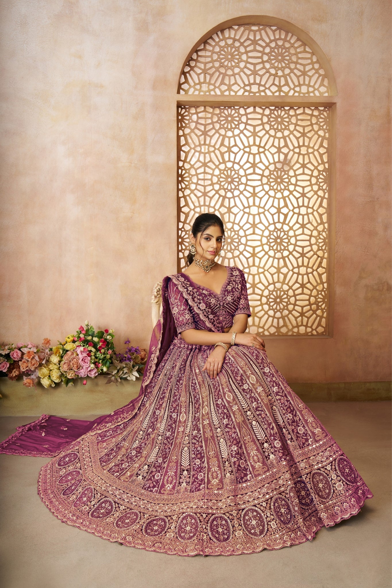 Stunning Designer Varying Embroidery With Tread Work Soft Net Wedding Lehenga Set