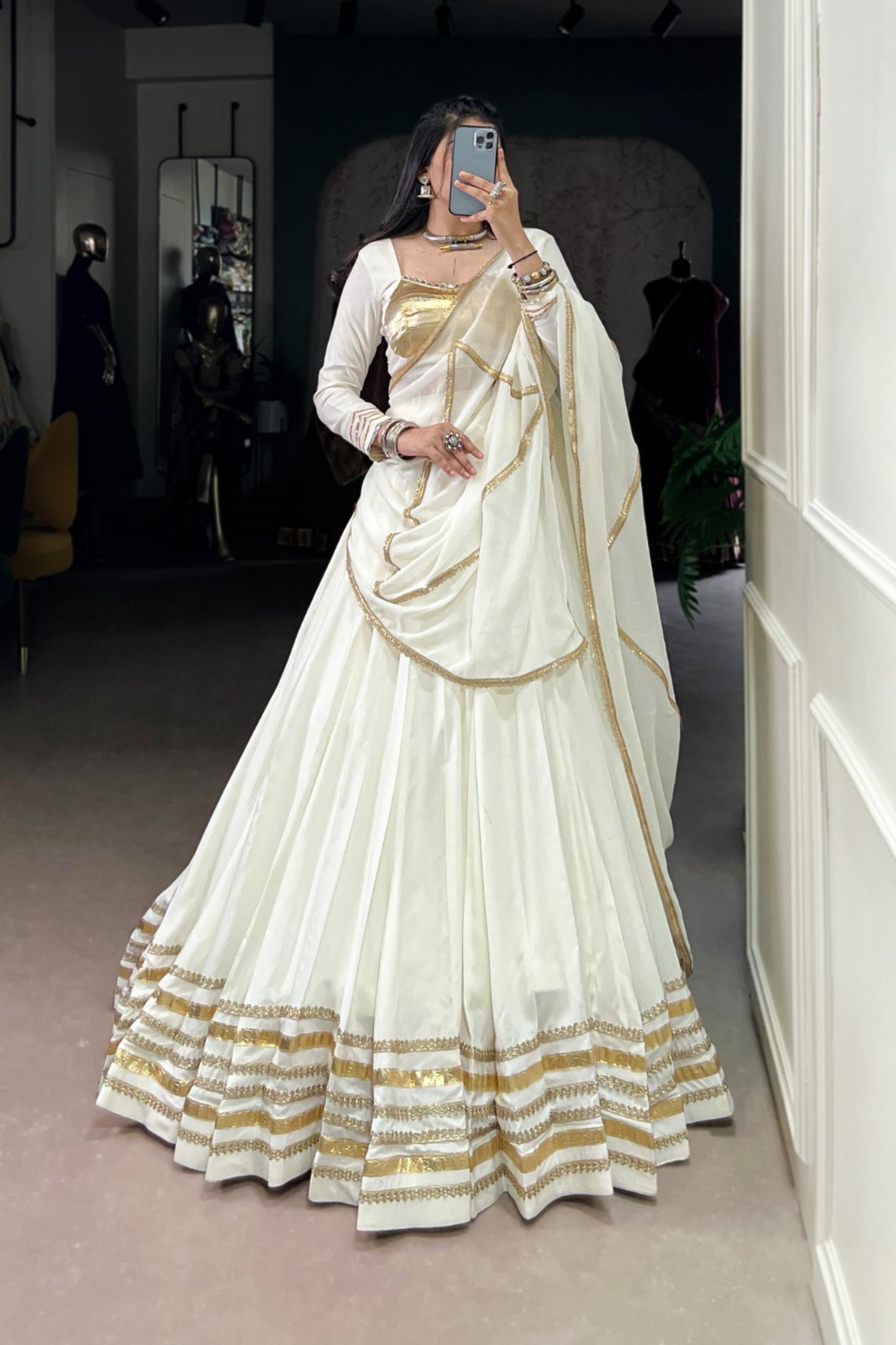 White Navratri Style Pure Rayon Embossed Design With Original Mirror Work Traditional Lehenga Choli Set