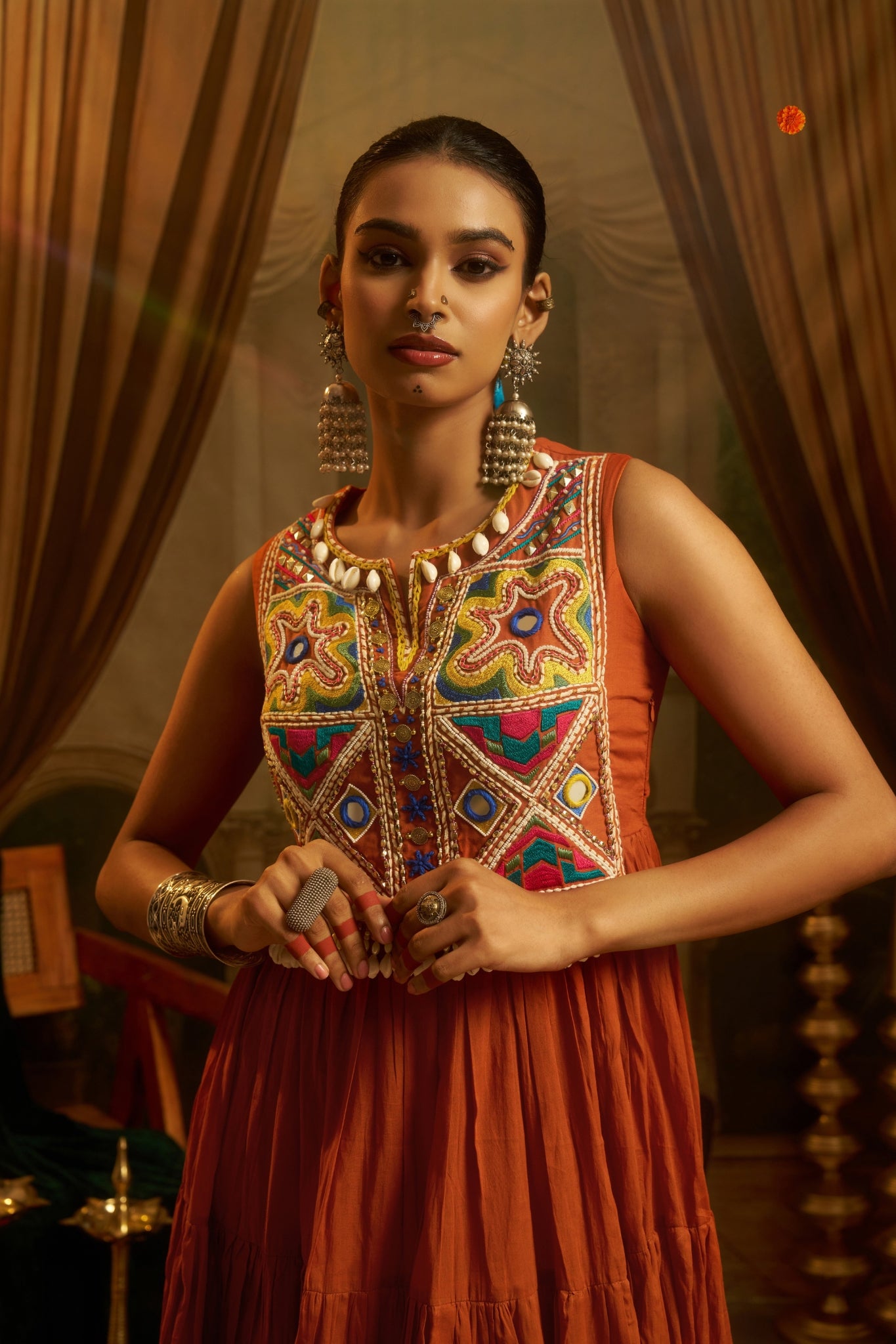 Rust Orange Tiered Anarkali Dress With Hand Embroidered Yoke & Cowrie Shell Fringe