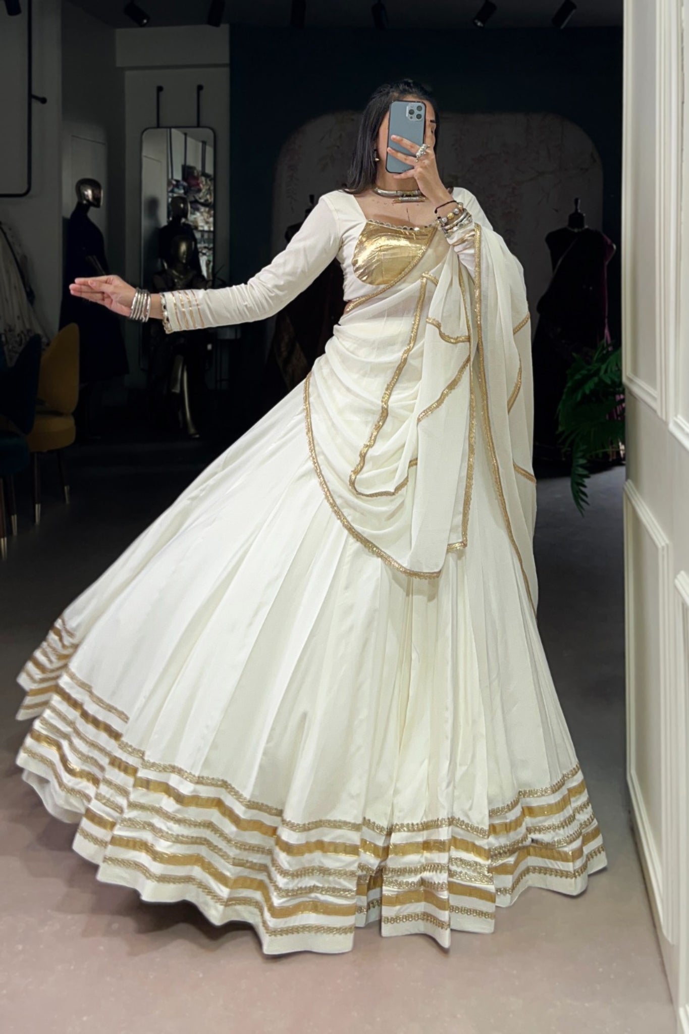 White Navratri Style Pure Rayon Embossed Design With Original Mirror Work Traditional Lehenga Choli Set