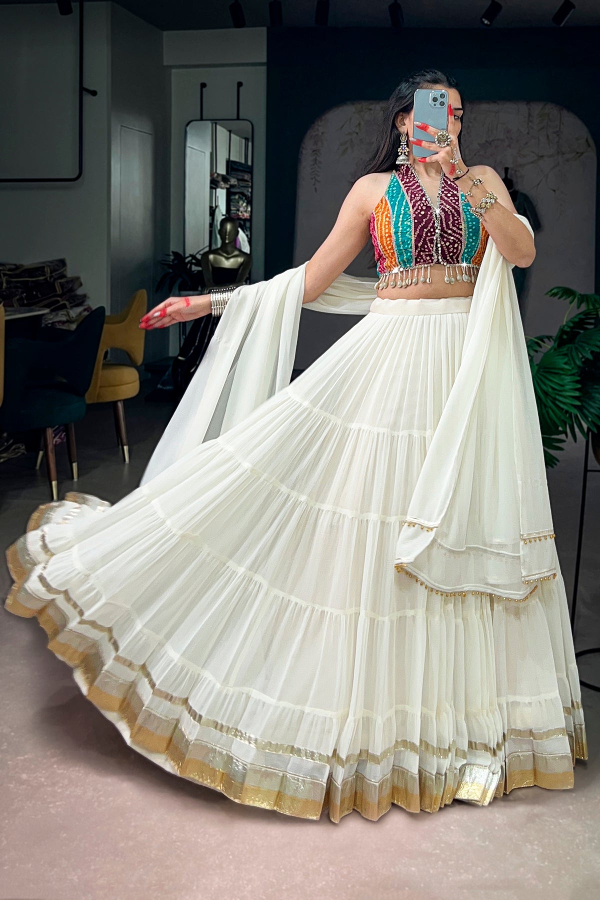 Ivory Tiered Navratri Garba Special Lehenga With Bandhani Mirror Work Blouse