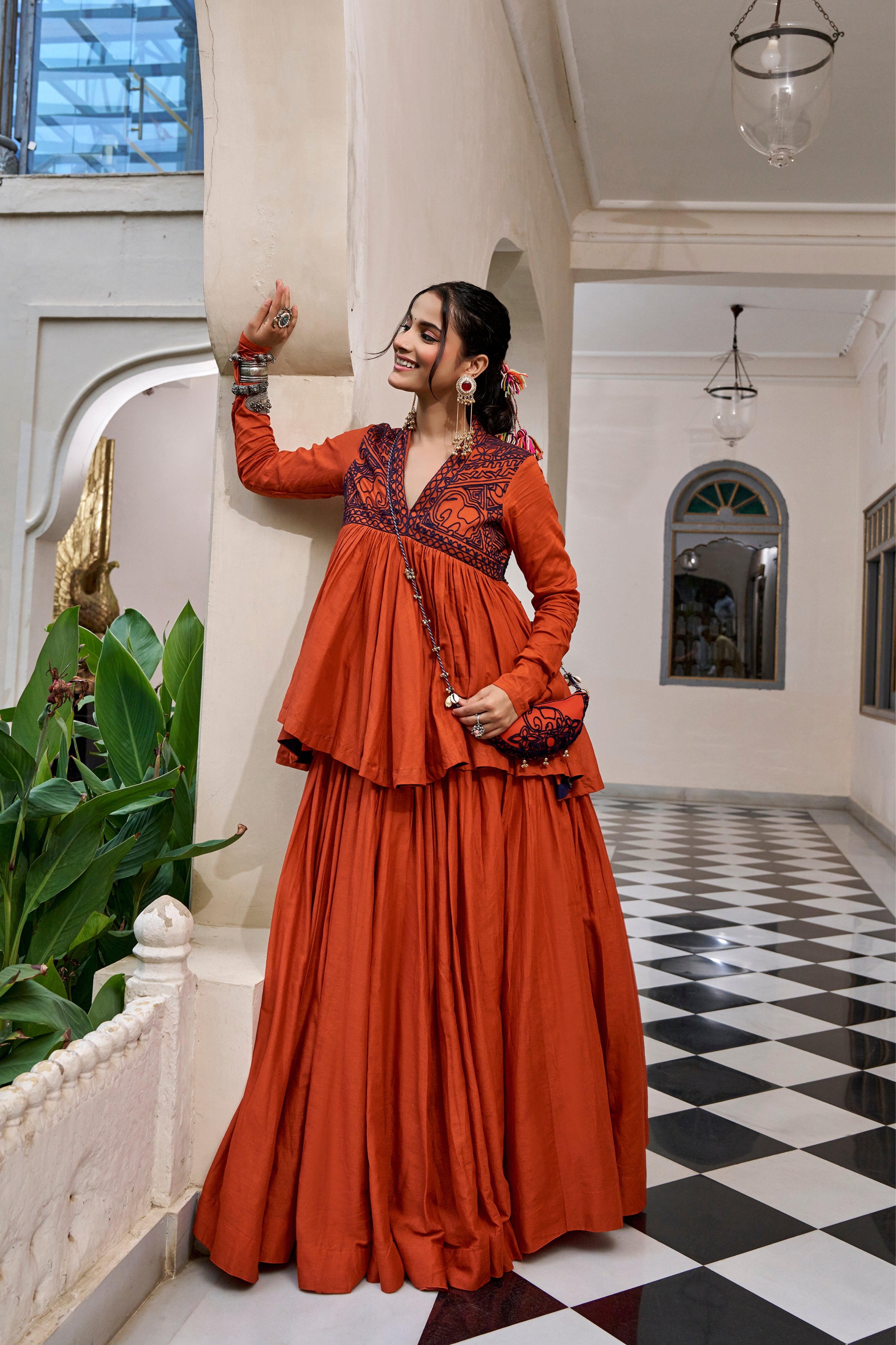 Rust Orange Pure Cotton Kashida Work Navratri Lehenga Choli With Matching Purse