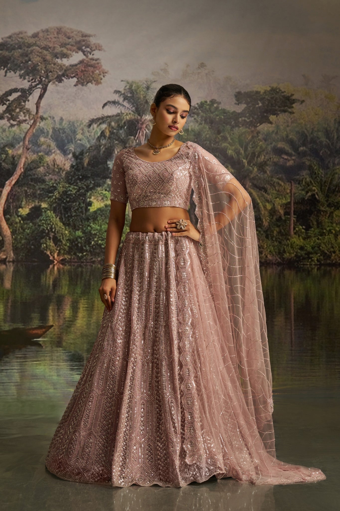 Opulent Mauve Designer Dori, Zarkan And Sequins Masterwork Lehenga in Soft Net