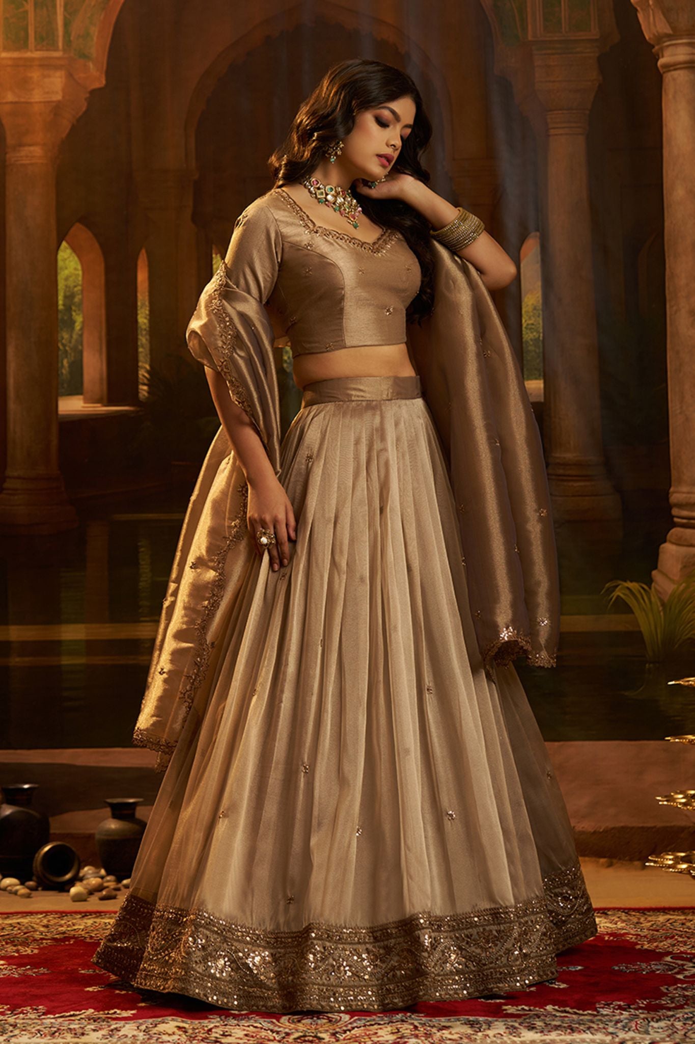 Luxury Brown Hiranya Silk Lehenga Set Featuring Art Silk Blouse And Detailed Embroidered Dupatta