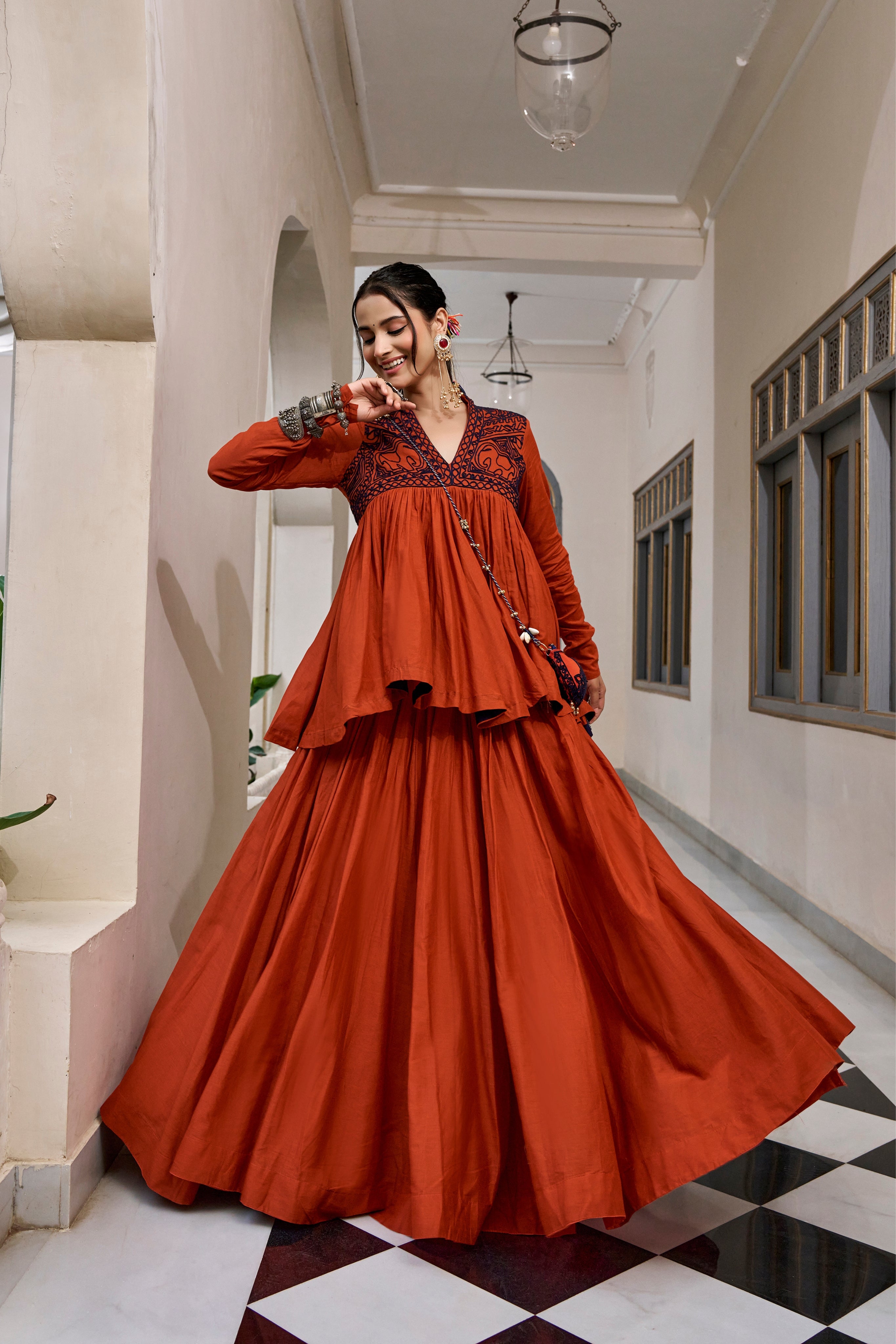 Rust Orange Pure Cotton Kashida Work Navratri Lehenga Choli With Matching Purse