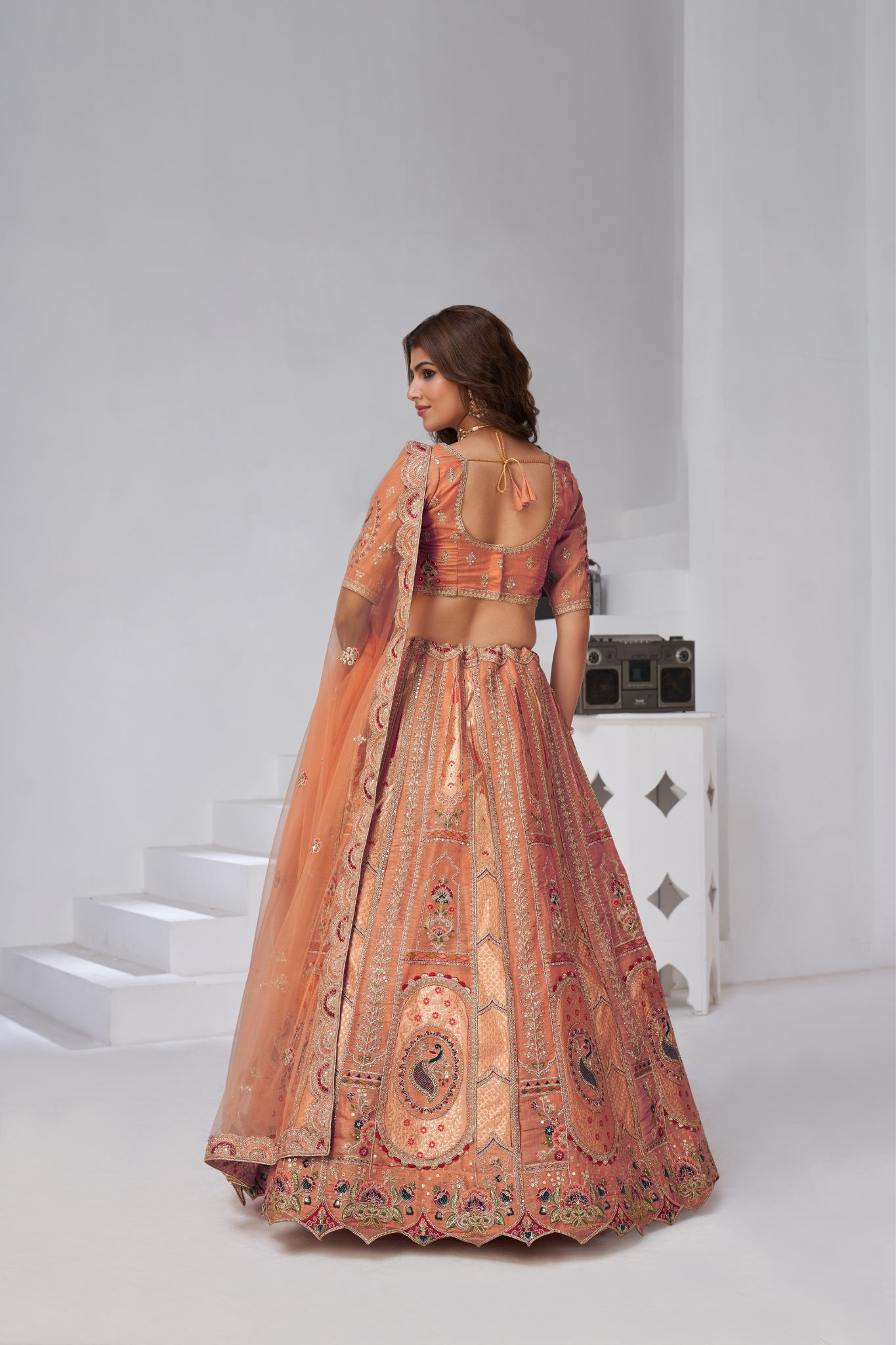 Opulent Aura Raw Silk Bridal Lehenga With Peacock And Paisley Motifs