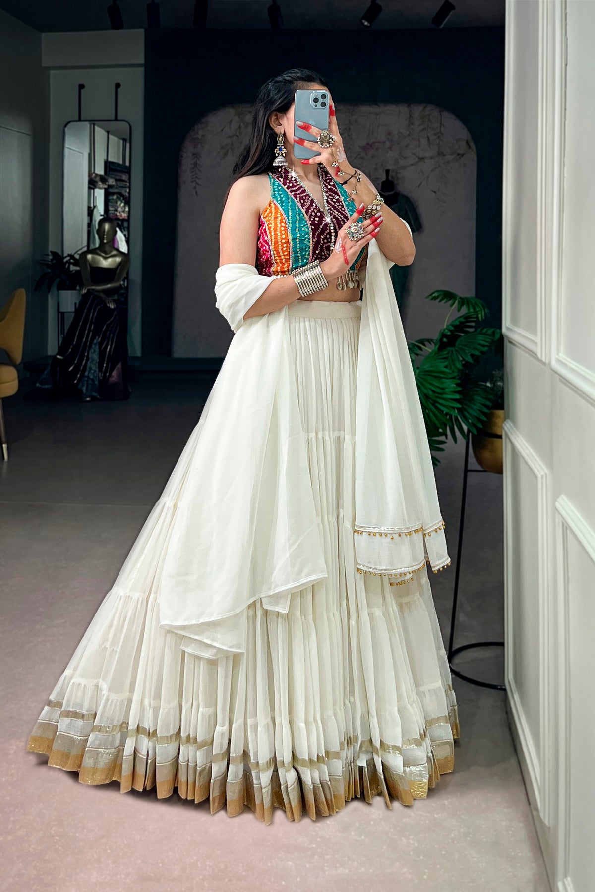 Ivory Tiered Navratri Garba Special Lehenga With Bandhani Mirror Work Blouse