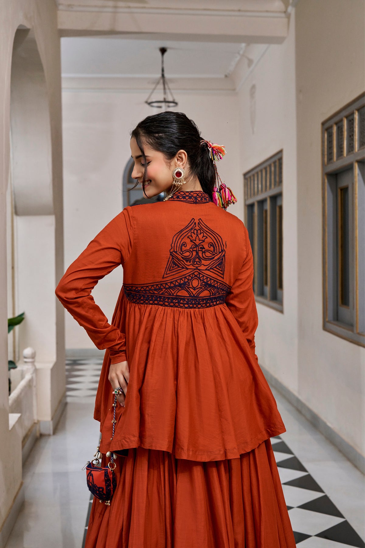 Rust Orange Pure Cotton Kashida Work Navratri Lehenga Choli With Matching Purse