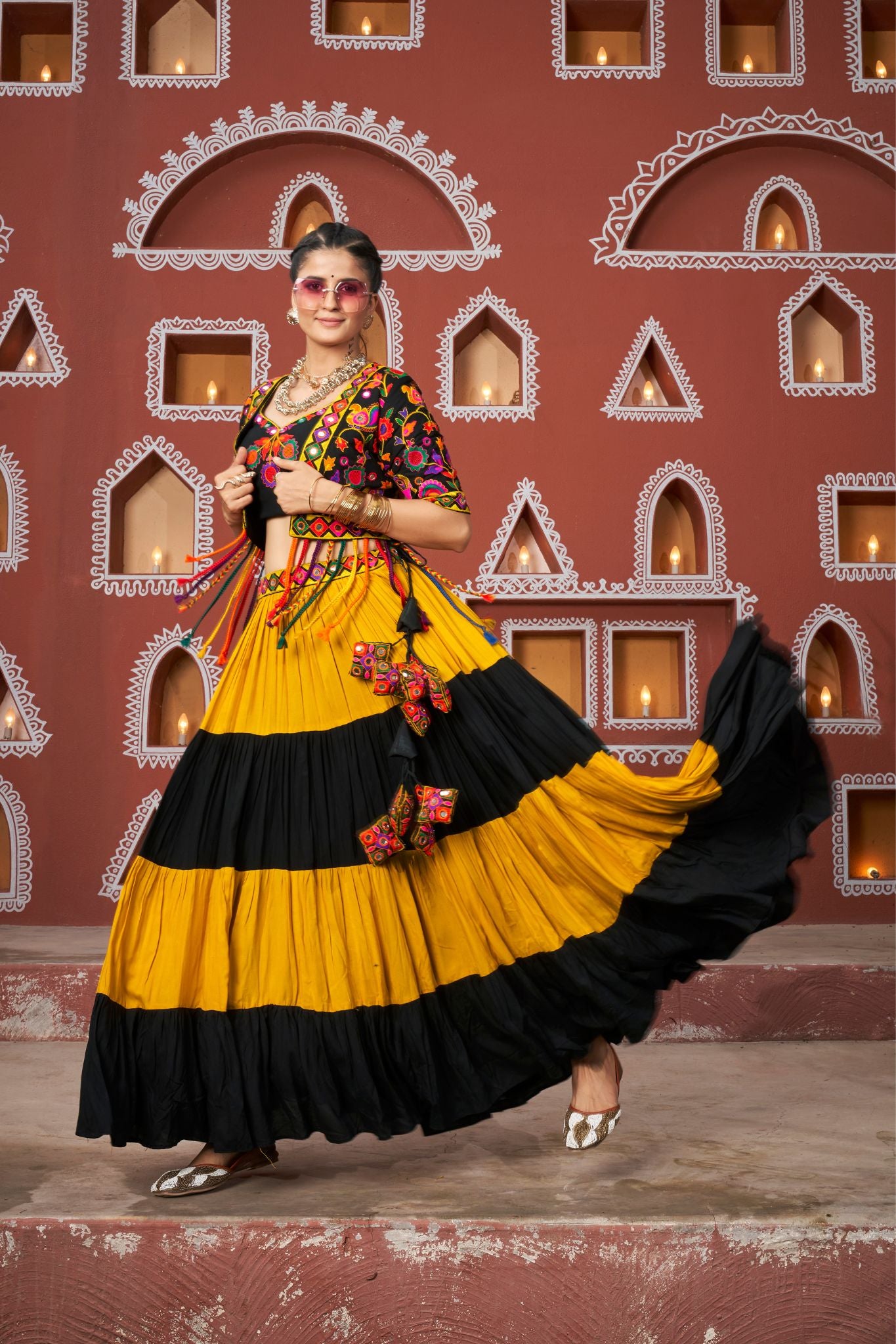 Orange And Black Tier Fancy Navratri Lehenga Choli