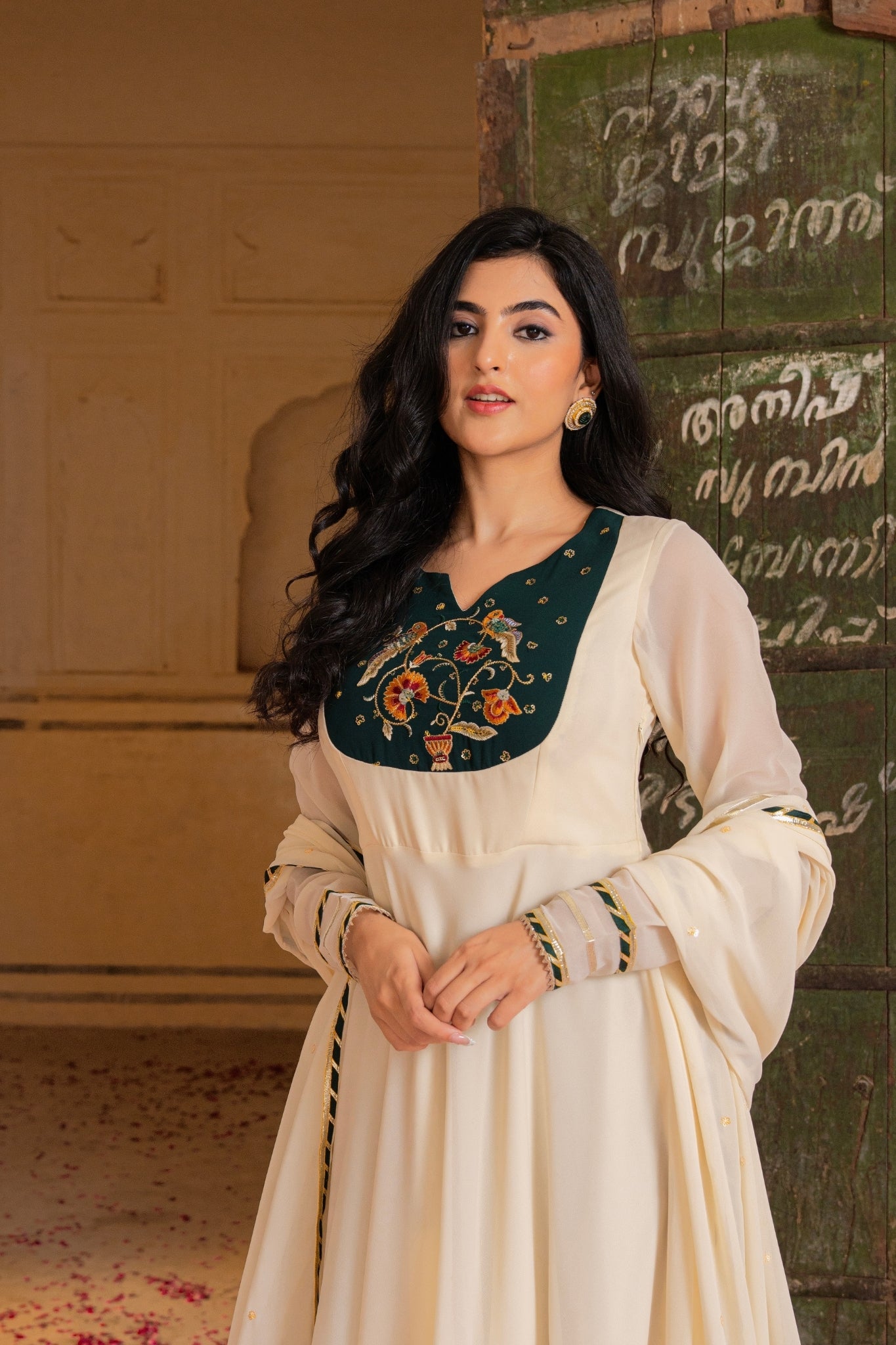 Royal Ivory Flow Anarkali Featuring Emerald Hand Embroidered Detail